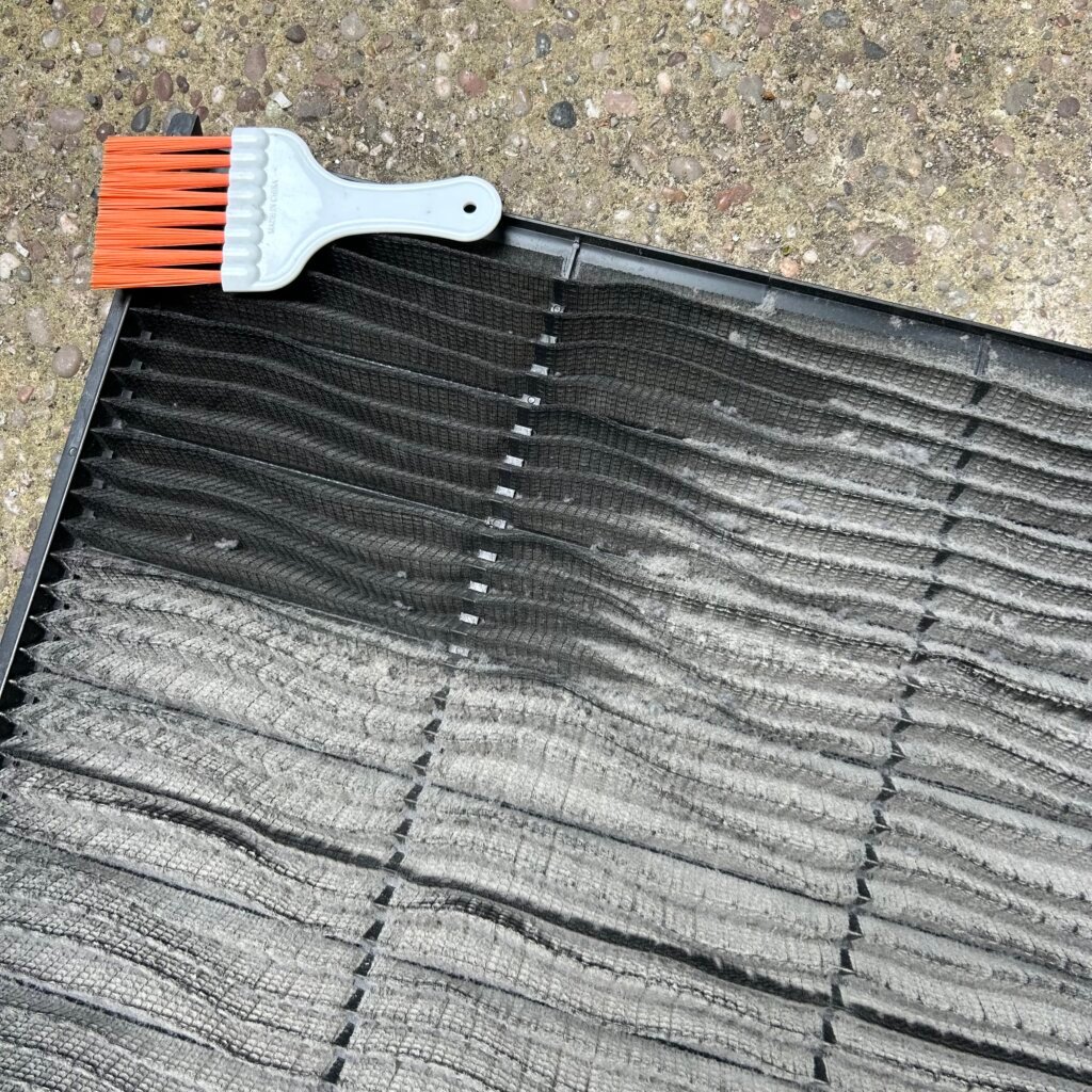 Air conditioning filter cleaning